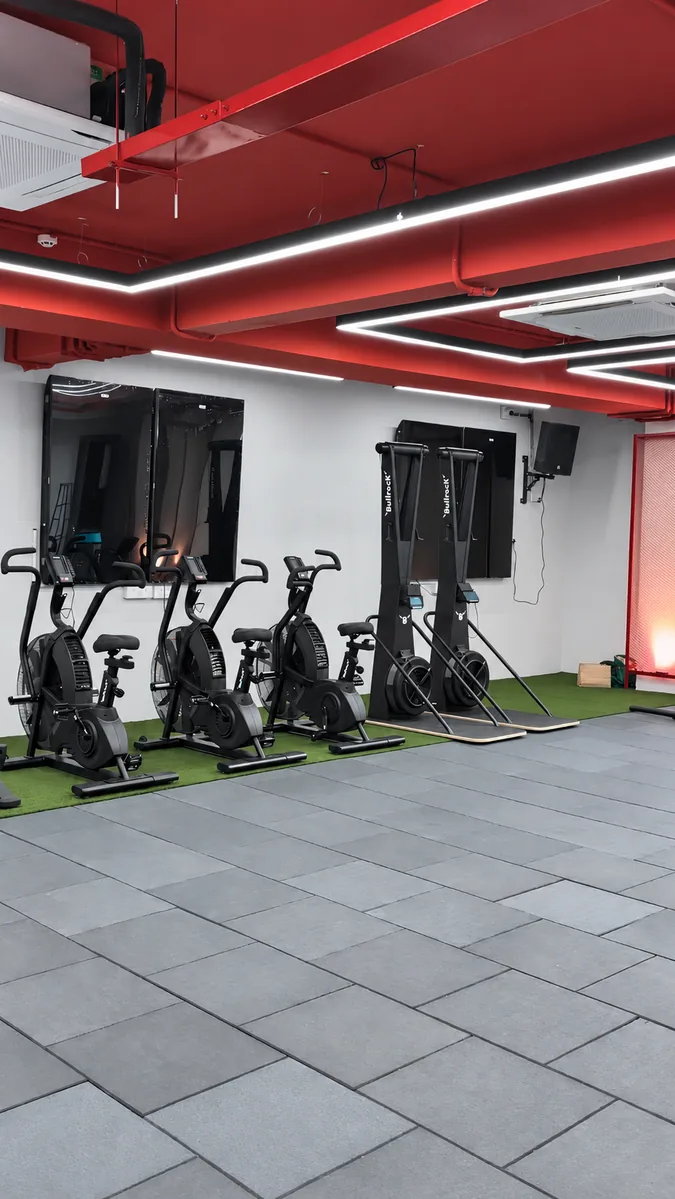 Open floor, rowers and bikes in the Peak studio