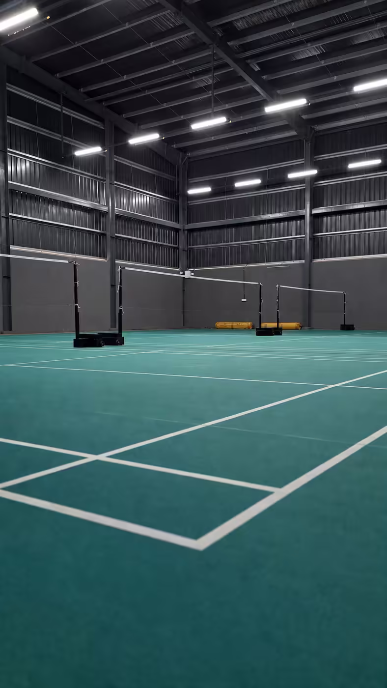 Badminton nets strung across the courts at Game Theory Panathur